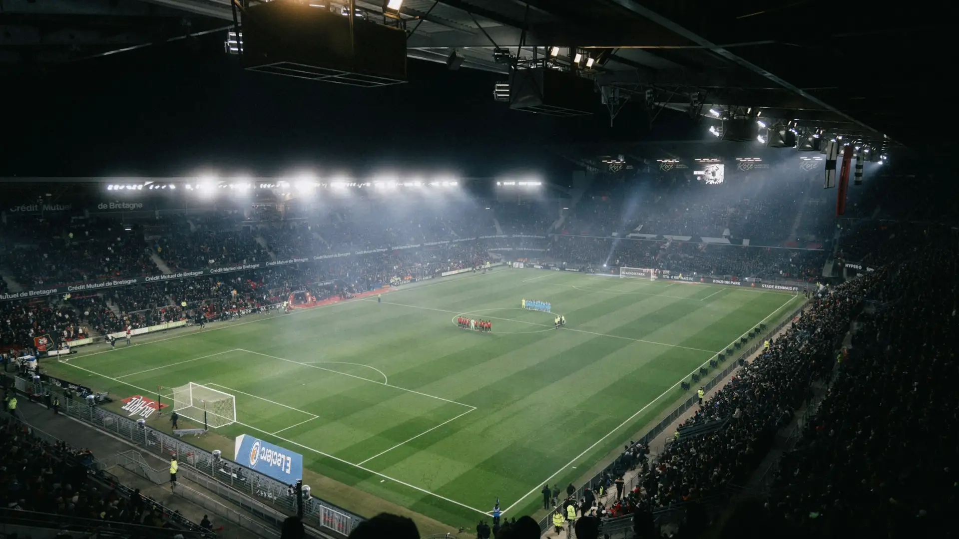 Floodlit football stadium at night – watch live football with IPTV UK